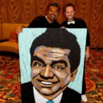 Tim Decker with George Lopez speed painting at a charity event.